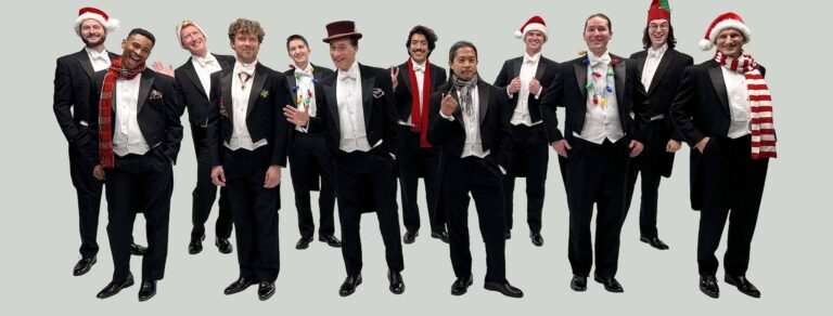chanticleer group with holiday hats and colors