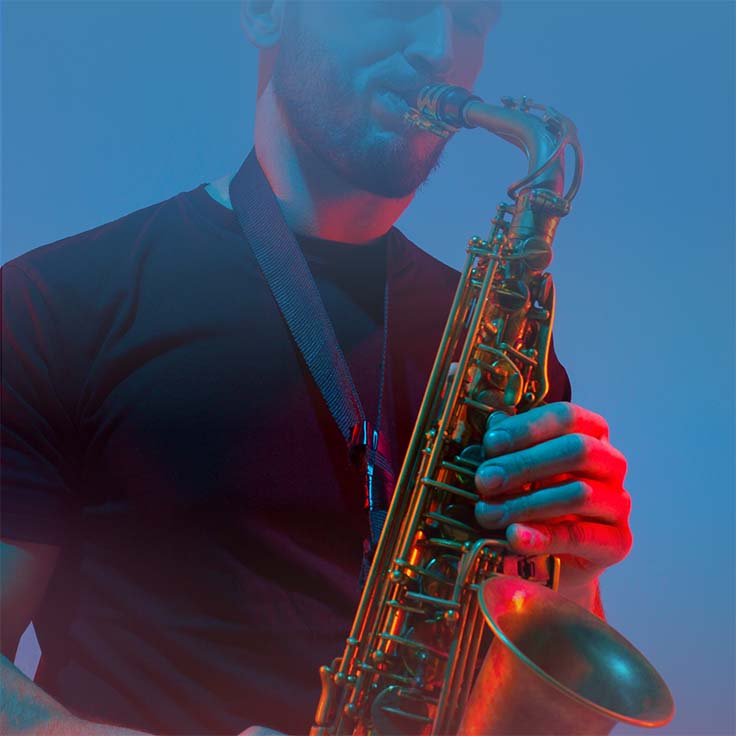 A man playing the saxophone.