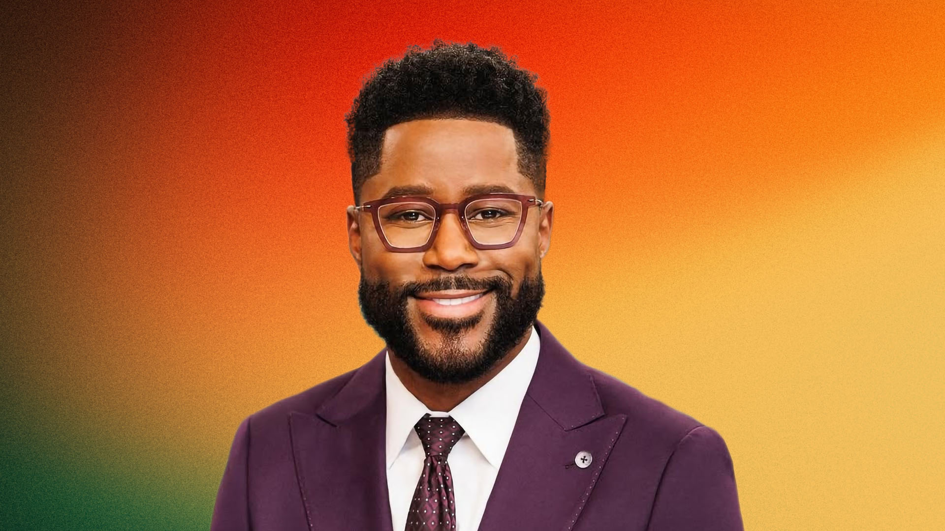 Nate Burleson smiling, with short curly hair and a full beard, wearing dark-framed glasses, a dark purple suit, white shirt, and patterned tie, smiling against a warm orange and green gradient background.