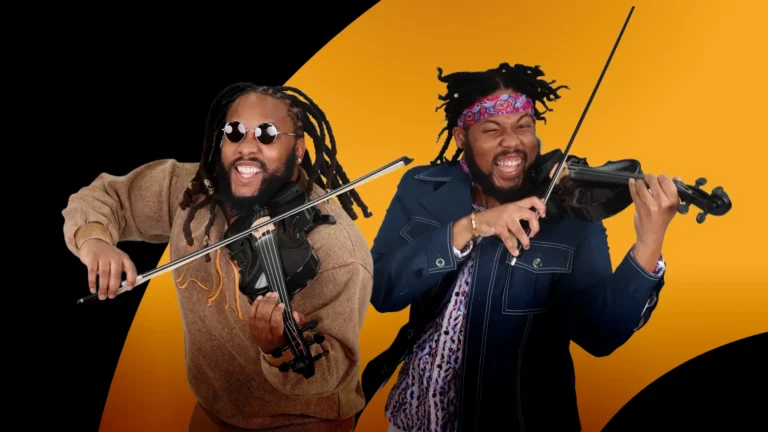 Two musicians energetically play violins, exuding passion and joy. They are captured mid-performance, showcasing their musical talent with vibrant body language. Their distinctive style is highlighted by contemporary clothing, and the bold black and orange background adds a dramatic flair