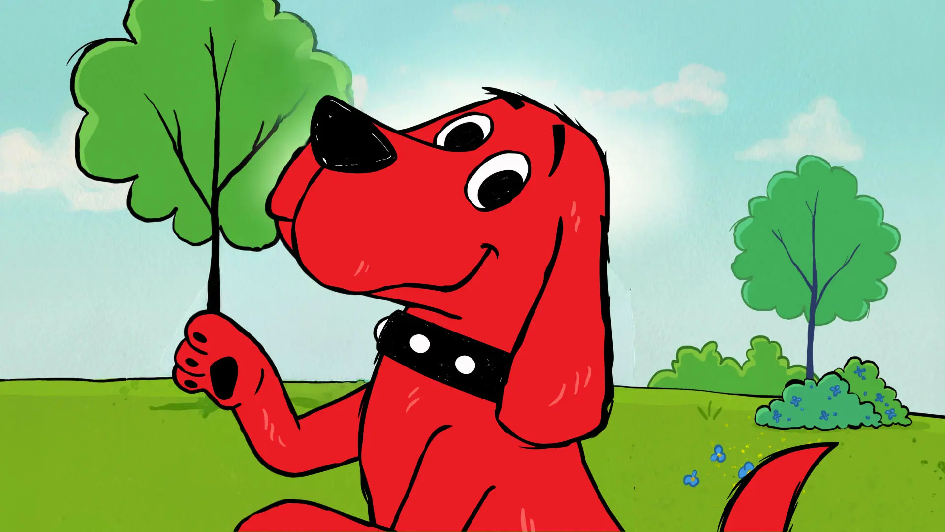 An illustrated poster featuring Clifford, the Big Red Dog, smiling against a grassy, tree-dotted landscape, promoting a musical adaptation.