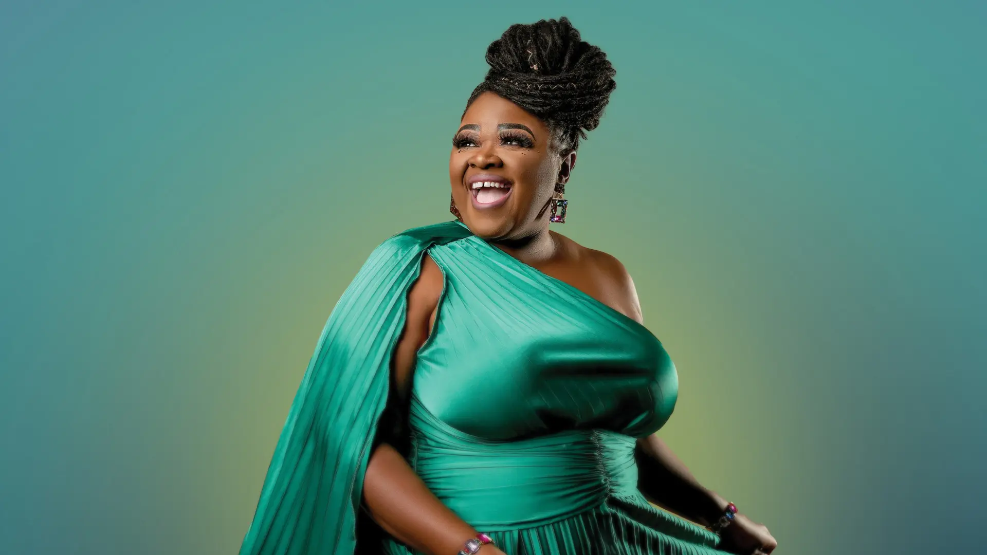 A woman in an exquisite green gown radiates joy and elegance, exuding confidence with a radiant smile. Her intricately styled hair and expressive demeanor reflect grace and poise against a softly hued background.